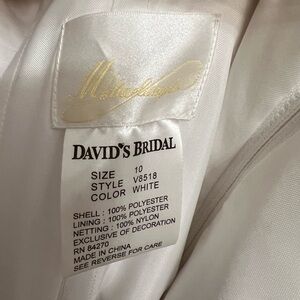 David’s bridal wedding dress size 10 wore as a pageant dress one time.Smoke-free